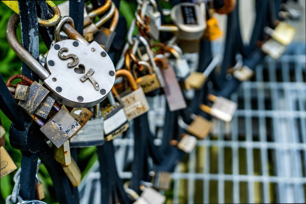 Colorful love locks attached to fence at Namsan Tower
