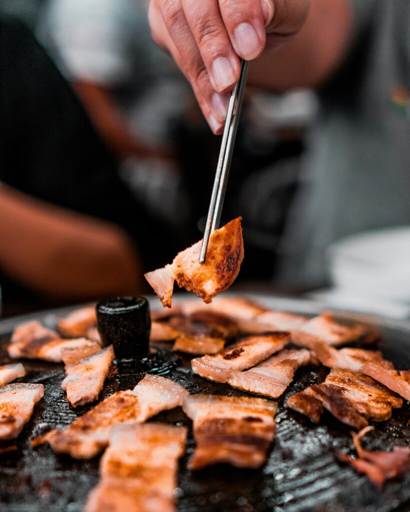 Samgyeopsal pork belly on Korean BBQ grill