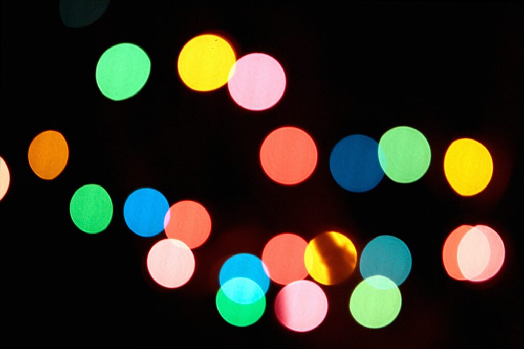 Official K-pop lightsticks glowing at concert