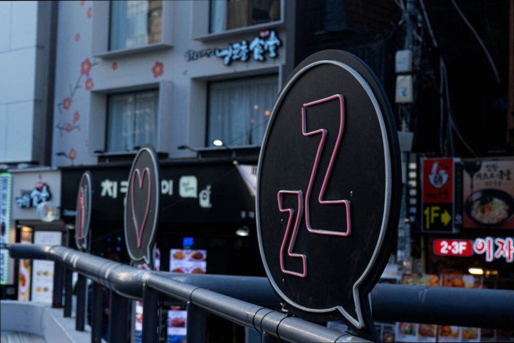 Street lined with photo booth shops in Hongdae Seoul