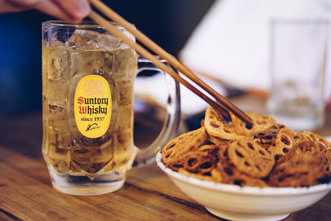 brown chopsticks on white ceramic bowl